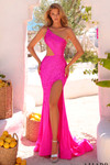 Model wearing a bright pink one-shoulder fitted prom dress with asymmetrical cut-out and thigh-high slit.