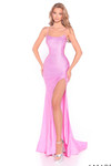 Model in a bright pink beaded fitted gown with a scoop neckline and thigh-high slit.