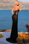 Back view of the black embellished lace gown showing the lace-up back and fitted silhouette.