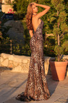 Back view of the leopard print gown showing the open low back and fitted silhouette.