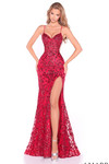 Model in a red sequin lace fitted prom dress with sweetheart neckline and high slit.