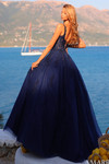 Back view of Amarra 89429 in navy showcasing lace-up back and voluminous tulle ball gown.