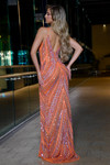 Jasz Couture 7611 in Orange back view displaying elegant V-back with delicate spaghetti straps and diagonal beaded pattern