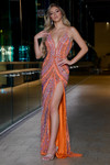 Jasz Couture 7611 in Orange front view showcasing fully beaded sheath silhouette with deep V-neckline, spaghetti straps, and thigh-high slit