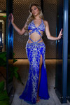 Royal blue Jasz Couture 7900 gown with intricate beaded lace and strappy open bodice displayed in a full front pose.