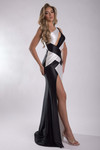 Side view of black/white Jasz Couture 7907 showing the fitted silhouette and thigh-high slit.
