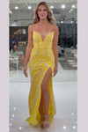 Jasz Couture 7910 in Yellow front view showcasing beaded sheath silhouette with leg slit