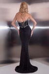 Jasz Couture 7915 in Black back view showcasing lace-up back and beaded fitted skirt