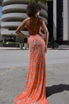 Back view of orange Jasz Couture 7928 showing slim straps and beaded train.