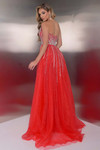 Back view of red Jasz Couture 7932 showing straight-across back and airy beaded tulle overskirt.