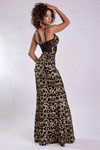 Jasz Couture 7935 in Black/Gold back view showing exposed boning and animal print skirt
