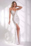 Model in a white strapless beaded cat-eye gown with asymmetrical keyhole and high slit.