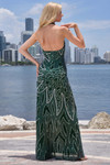 Back view of Jasz Couture 7975 in emerald showing straight across back and all-over beadwork.