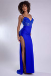 Model wearing a royal blue fitted gown with beaded applique bodice, V-neckline, ruching, and high slit.