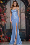 Colors Dress 3852 in Peri with a fully beaded strapless neckline, corset bodice, and dramatic front bow.