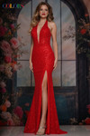 Colors Dress 3863 in Red with a plunging halter neckline, fully beaded mesh fabric, and thigh-high slit.