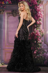 Colors Dress 3885 in Black back view showing mid-open back and dramatic organza ruffles.