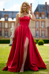 Sherri Hill 57006 in Red featuring the thigh-high slit and sheer side panel detail on the skirt.