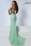 Johnathan Kayne 3262 in Mint with pearl beading, V-neckline, cut-outs, and open back.