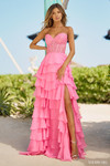 Sherri Hill 56162 in Bright Pink with lace corset bodice and tiered chiffon ruffles.