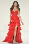 Sherri Hill 57479 in Red with bow detail and flowing A-line silhouette.