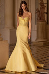 Sherri Hill 57621 in Yellow with intricate lace corset bodice, dainty bow detail, and dramatic taffeta mermaid skirt.
