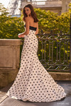Sherri Hill 57665 in Ivory/Black back view showcasing the fit-and-flare silhouette and flowing train.