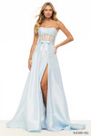 Sherri Hill 57697 in Ice Blue with sheer corset bodice, bow detail, and flowing A-line skirt.