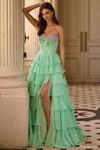 Sherri Hill 57799 in Light Green featuring corset bodice and flirty slit through ruffle layers.