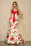 Sherri Hill 57818 in Ivory/Red Print with V-neckline, front bow detail, and floral satin mermaid silhouette