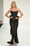 Sherri Hill 57921 in Black with satin corset bodice, lace skirt, and detachable taffeta bow.