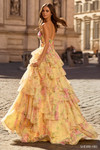 Sherri Hill 58000 in light yellow print with chiffon layers, fitted corset bodice, and flowing A-line silhouette.
