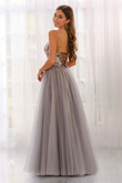 Colette CL6008 back view highlighting lace-up corset and layered tulle skirt