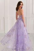 Colette CL6109 back angle showing mid-open back and flowing lilac embroidered skirt