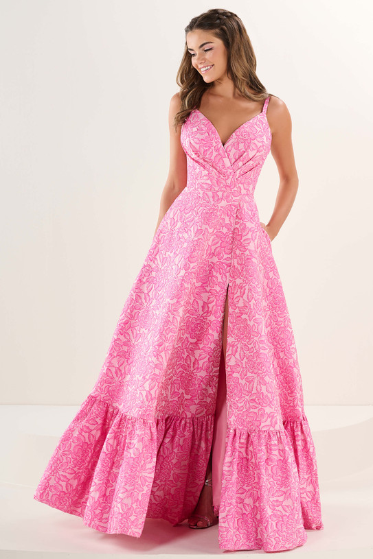 Tiffany Designs 16304 in Blooming Pink — front view with sweetheart neckline, spaghetti straps, subtle slit, and wide ruffle hem.