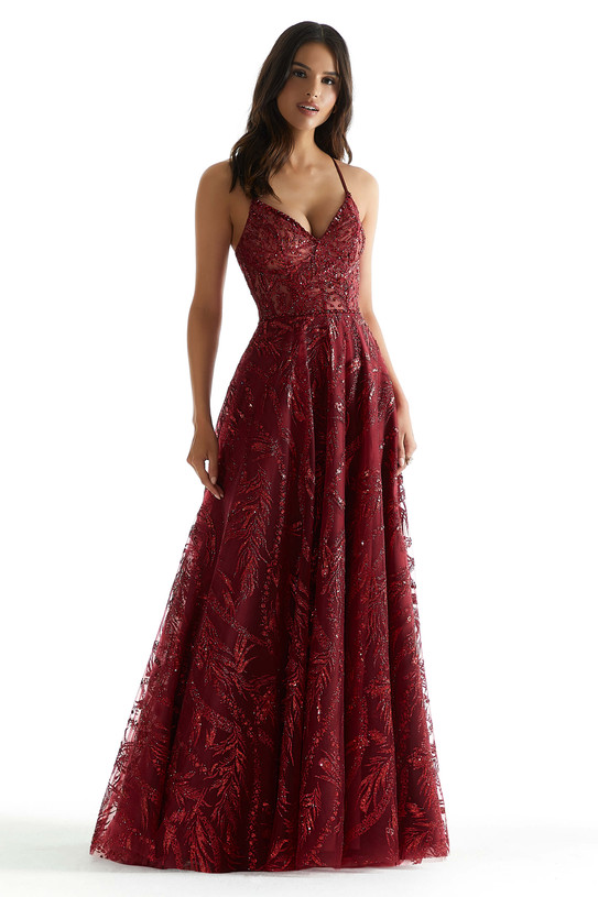 Front view of Morilee 49323 sangria A-line prom dress with beaded V-neckline, sheer boned bodice, and patterned glitter net skirt with glistening glow