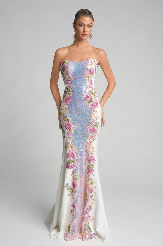 Model wearing Portia and Scarlett PS26286, a strapless fit-and-flare gown with pastel blue sequin panel and floral embroidery.