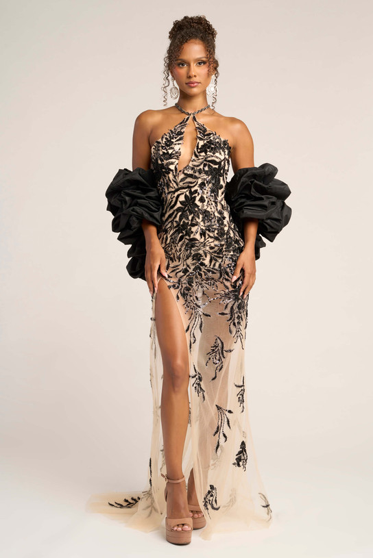 Portia and Scarlett PS26319E black and nude semi-sheer sheath evening gown with halter keyhole bodice, and detachable voluminous taffeta sleeve wrap.