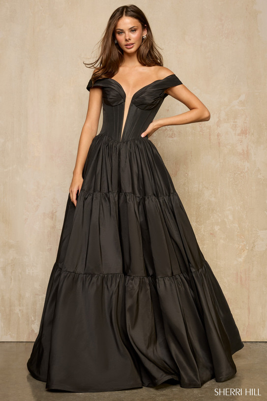 Sherri Hill 57945 in Black with off-the-shoulder neckline and plunging illusion corset bodice.