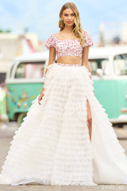 Two-piece bridal set with lace crop top and flowy skirt