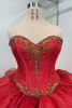 Beaded sweetheart satin bodice on Red Gold quinceanera dress