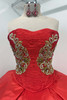 Beaded applique sweetheart bodice on red quinceanera dress
