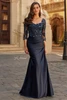 Front view of navy La Femme 31802 mother gown with lace bodice