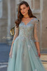 Close view of floral embroidery and V-neckline on La Femme 33536