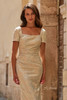 Close view of square neckline and metallic floral brocade on La Femme 33598