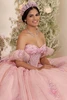 Blush sparkle-tulle ball gown with chapel train, side view