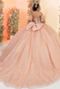 Rose gold quinceanera gown with oversized bow and chapel-length train