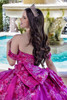 Magenta quinceanera gown back with oversized bow and corset detail