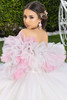 Ivory pink quinceanera gown with layered ruffle sleeves and floral cascade