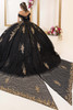Black and gold quinceanera gown with exaggerated bow tails, train detail